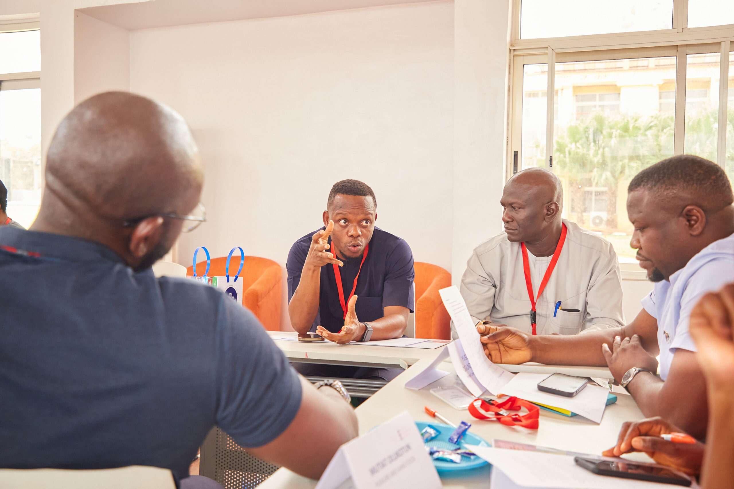Owner-managers in conversation at an executive retreat
