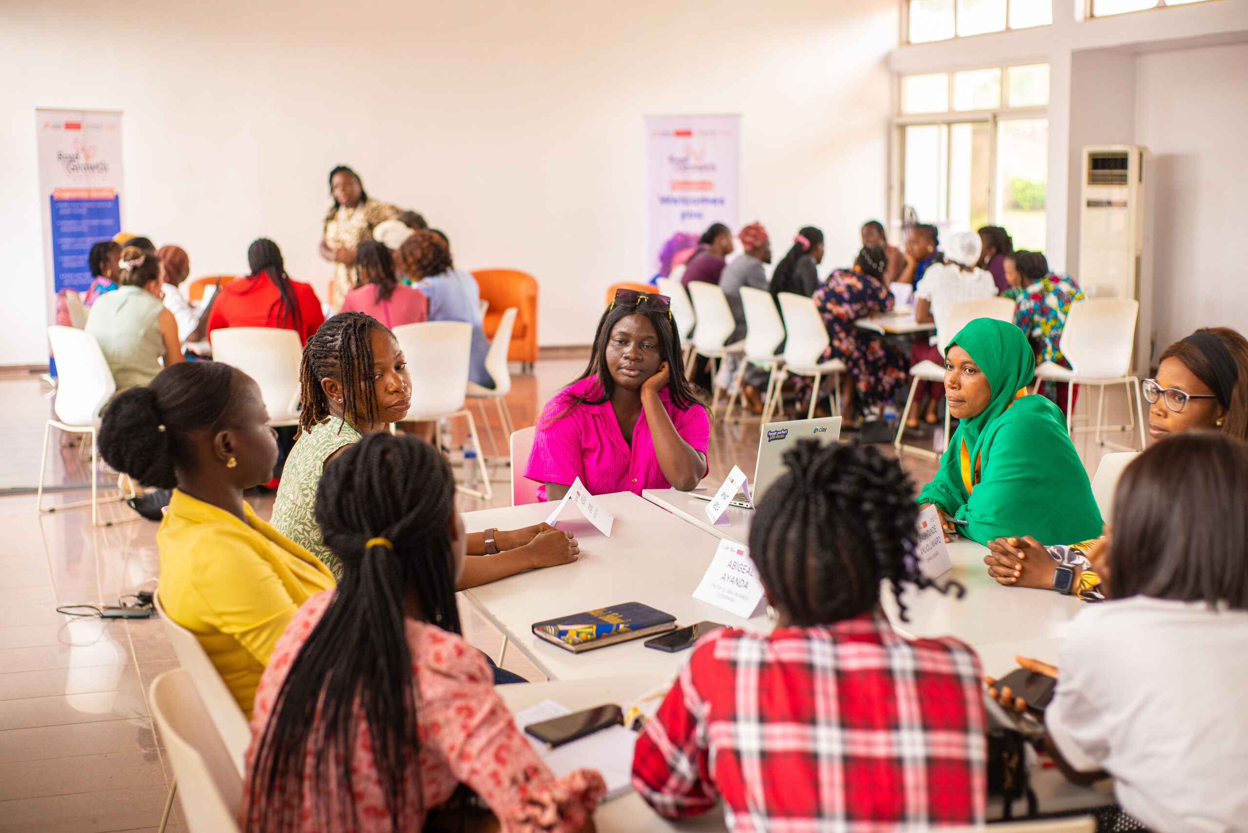 Woman presenting her business to a professional audience